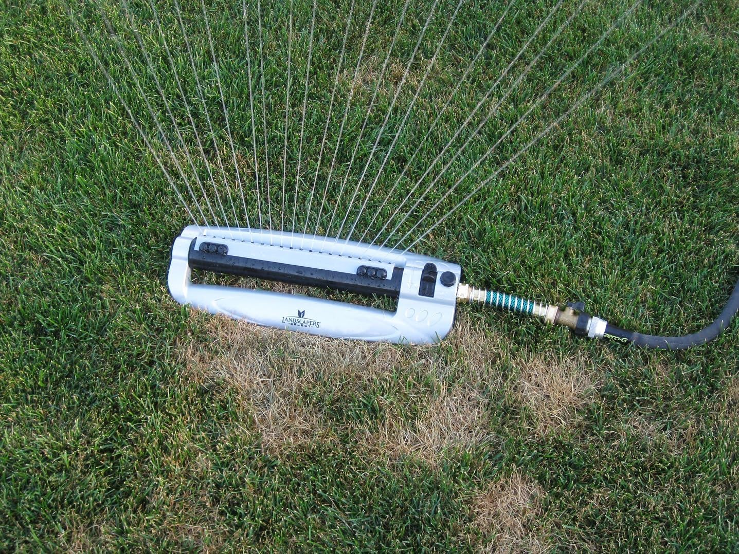 Metal Oscillating Lawn Sprinkler - Rust-Proof Aluminum Base - 4,100 Sq. Ft. Coverage - Easy Adjust Range Control - Built-in Spray Jet Cleaning Needle