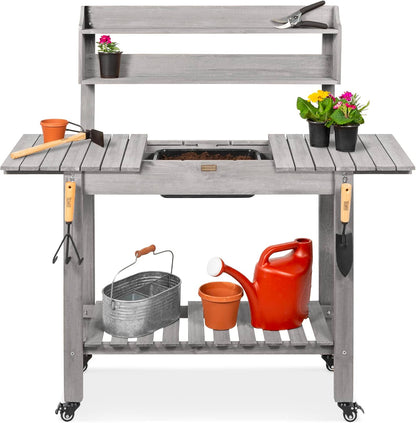 Best Choice Products Mobile Garden Potting Bench, Outdoor Wood Workstation Table w/Sliding Tabletop, 4 Locking Wheels, Food Grade Dry Sink, Storage Shelves - Sage Green