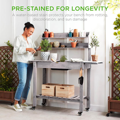 Best Choice Products Mobile Garden Potting Bench, Outdoor Wood Workstation Table w/Sliding Tabletop, 4 Locking Wheels, Food Grade Dry Sink, Storage Shelves - Sage Green